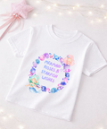 White t-shirt with mermaid-themed design and text on a light background