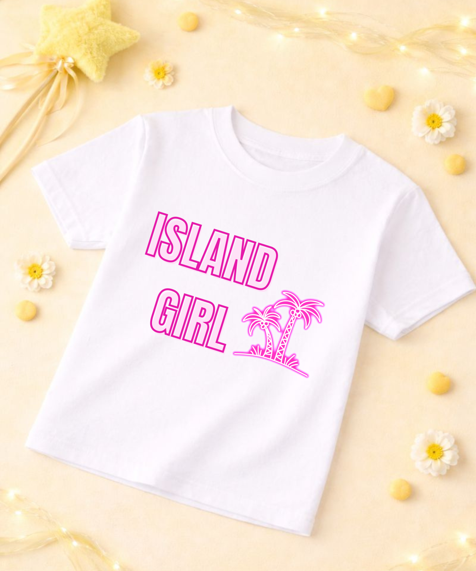 White t-shirt with pink 'Island Girl' text and palm tree graphic on a yellow background with flowers and lights.